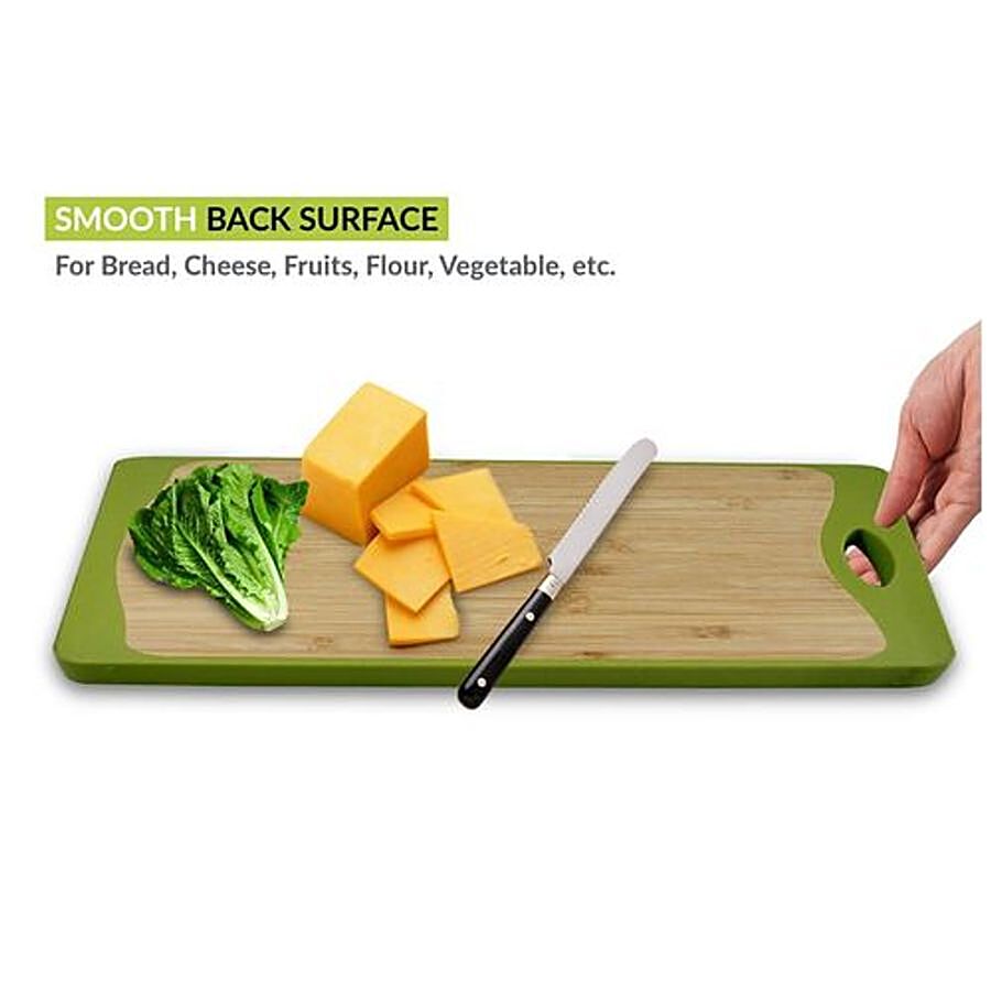 https://www.bigbasket.com/media/uploads/p/xxl/40165391-3_1-home-puff-vegetablefruit-cutting-chopping-board-2-in-1-double-sided-antibacterial-bamboo-large-with-premium-silicone-green.jpg