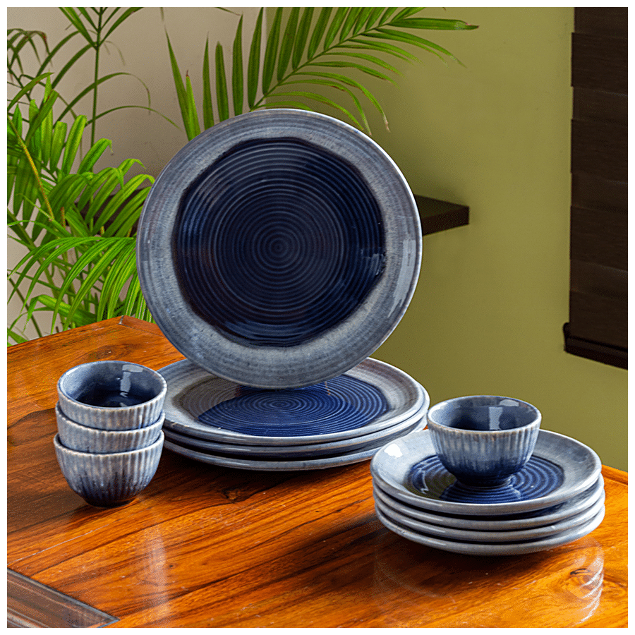 https://www.bigbasket.com/media/uploads/p/xxl/40239114_1-exclusivelane-ceramic-dinner-set-sapphire-swirl-hand-glazed-studio-pottery-microwave-safe.jpg